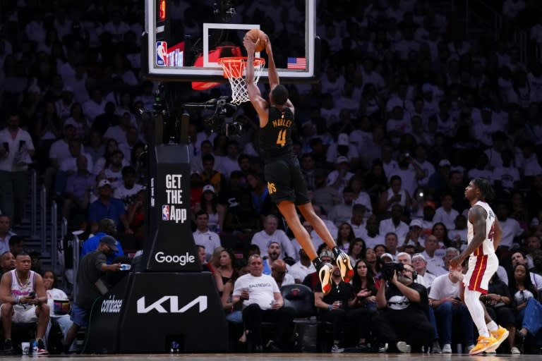 Evan Mobley of the Cleveland Cavaliers dunks the ball against Davion Mitchell in the Cavs' victory over the Miami Heat in game three of their NBA playoff series (Rich Storry)