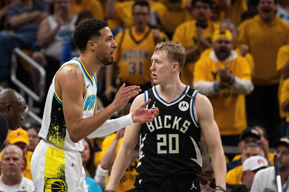 Pacers guard Tyrese Haliburton (0) reacts during a timeout in front of Bucks guard AJ Green during Game 5 at Gainbridge Fieldhouse on Tuesday.