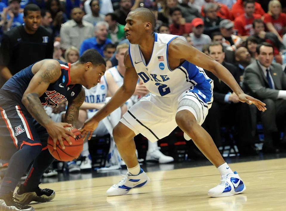 Duke Blue Devils guard Nolan Smith defends against Arizona Wildcats guard Lamont Jones.