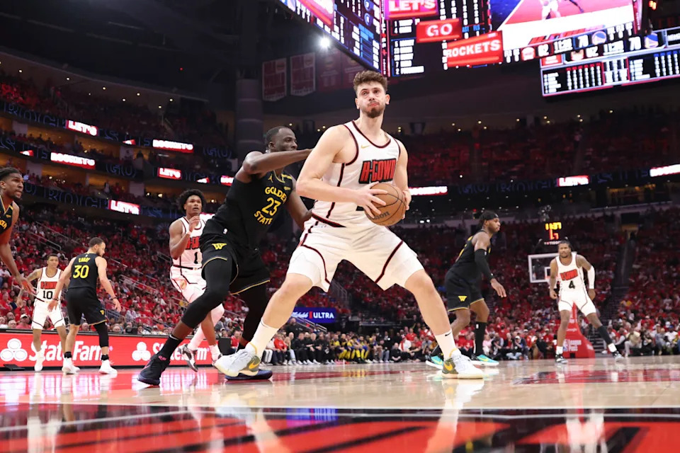 Warriors forward Draymond Green (23) defends against Rockets center Alperen Sengun (28).Troy Taormina-Imagn Images