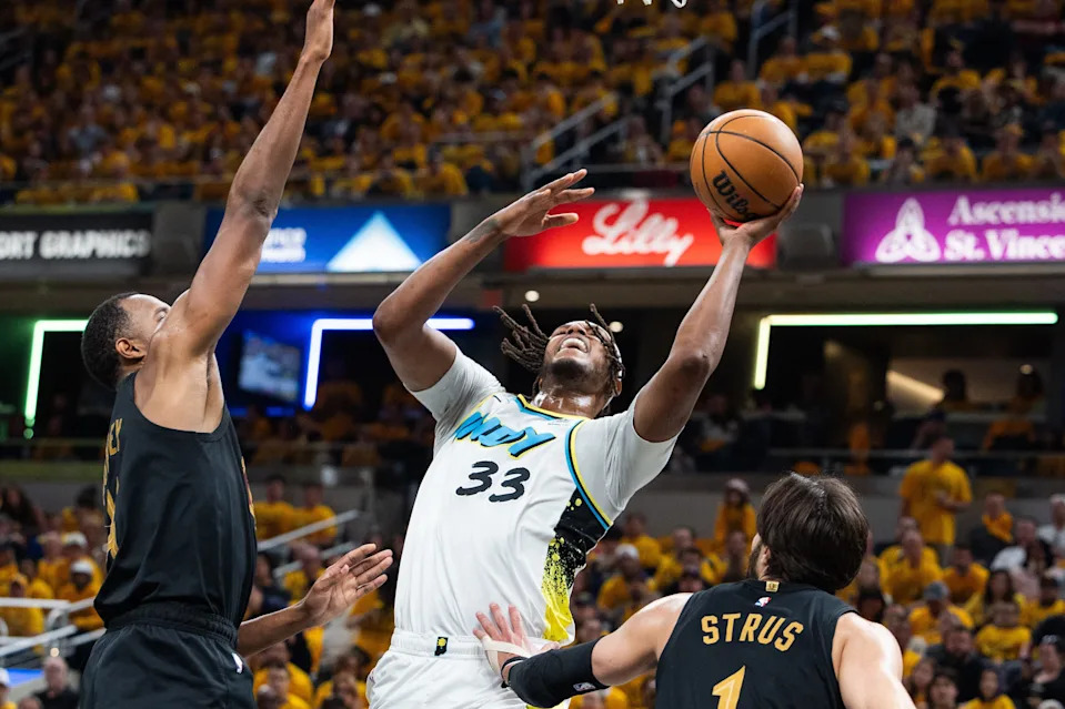 Cleveland Cavaliers forward Evan Mobley (4) contests a shot by Indiana Pacers center Myles Turner (33) during Game 3 of a second-round playoff series May 9, 2025, in Indianapolis, Indiana.