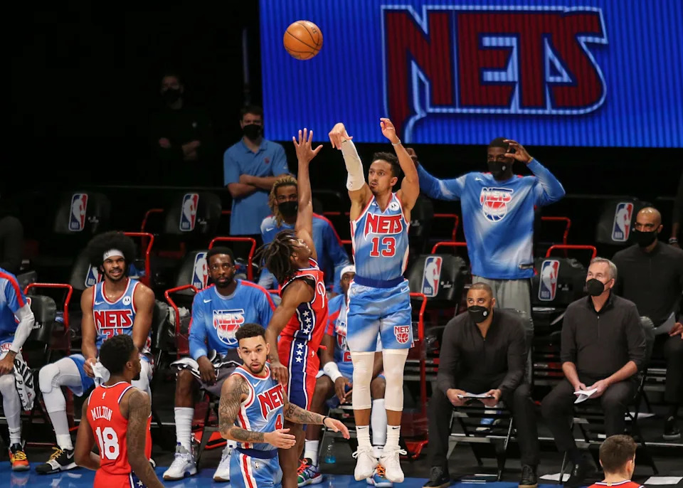 Jan 7, 2021; Brooklyn, New York, USA; Brooklyn Nets guard Landry Shamet (13) takes a three point shot against the Philadelphia 76ers in the first quarter at Barclays Center. Mandatory Credit: Wendell Cruz-USA TODAY Sports