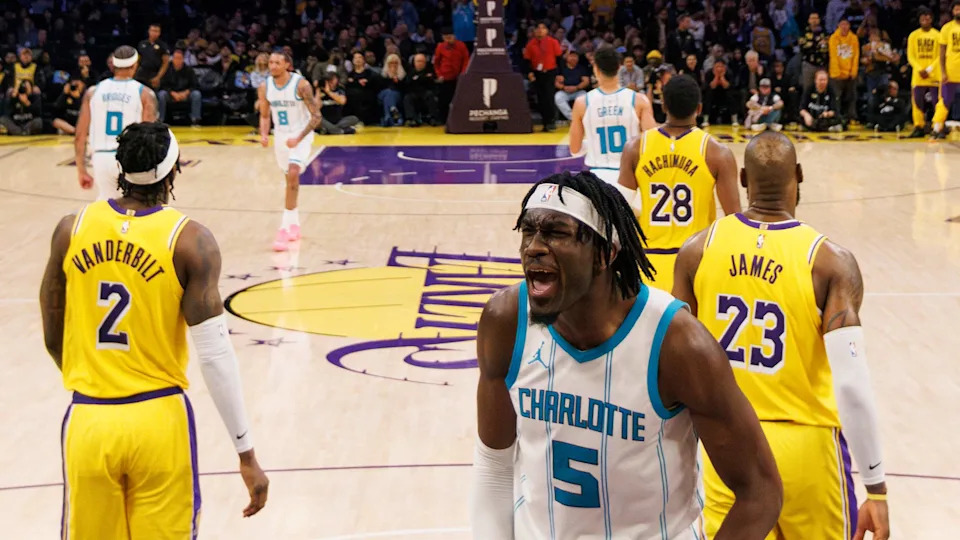 LOS ANGELES, CA - FEBRUARY 19, 2025: Charlotte Hornets center Mark Williams (5) reacts after Charlotte Hornets guard LaMelo Ball (1) scores to give the Hornets the lead late in the game at Crypto.com Arena on February 19, 2025 in Los Angeles, California. (Gina Ferazzi / Los Angeles Times via Getty Images)