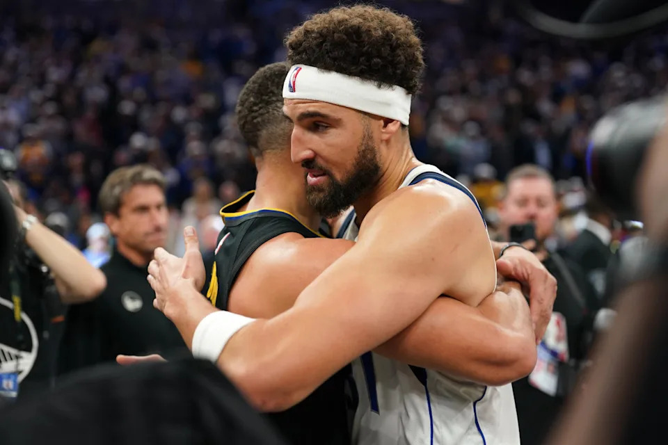 Dallas Mavericks guard Klay Thompson (31) hugs Golden State Warriors guard Stephen Curry (30) after a game at the Chase Center. Mandatory Credit: Cary Edmondson-Imagn Images