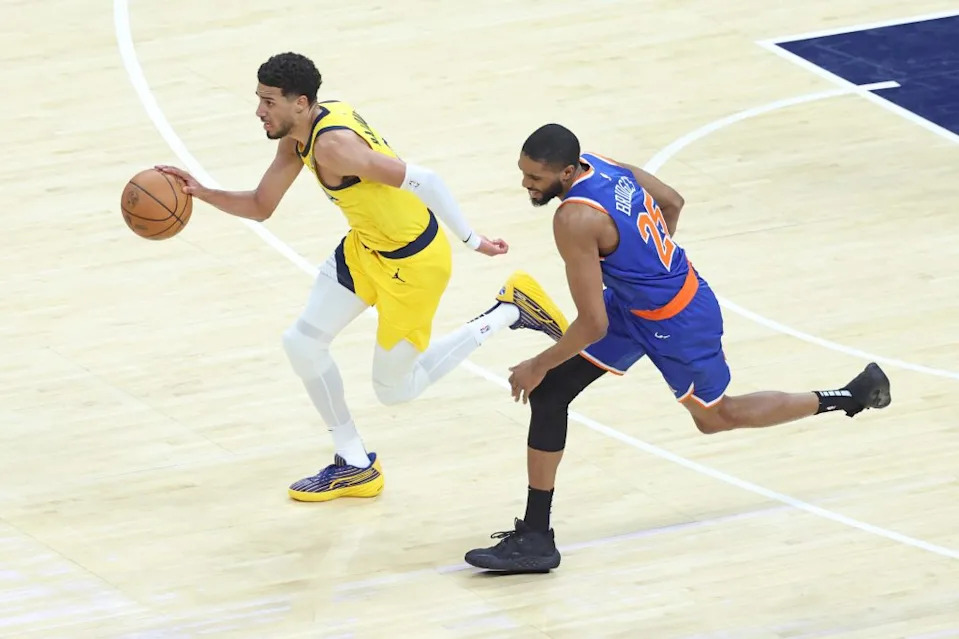 Tyrese Haliburton (0) of the Indiana Pacers drives down court as Mikal Bridges (25) of the New York Knicks gives chase during the third quarter. Charles Wenzelberg / New York Post