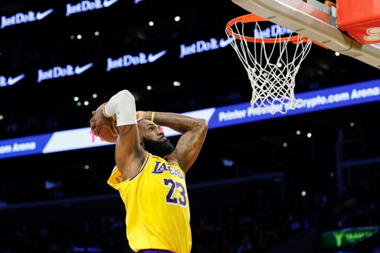 LeBron James of the Los Angeles Lakers dunks the ball in the Lakers