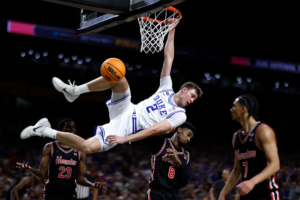 SAN ANTONIO, TEXAS - APRIL 5: Cooper Flagg #2 of the Duke Blue Devils dunks the ball against the Houston Cougars in the first half during the Final Four round of the men's NCAA basketball tournament at Alamodome on April 5, 2025 in San Antonio, Texas. (Photo by Lance King/Getty Images)