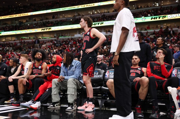 Guard Josh Giddey (3) stands on the sideline in front of the Bulls bench near the end of a 109-90 loss to the Miami Heat in a play-in tournament game on Wednesday April 16, 2025, at the United Center. (Armando L. Sanchez/Chicago Tribune)