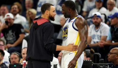 Draymond Green (right) speaks with teammate Stephen Curry after reacting furiously over a technical foul in Golden State