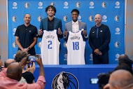 Newly drafted Dallas Mavericks players Dereck Lively II of Duke and Olivier-Maxence Prosper...
