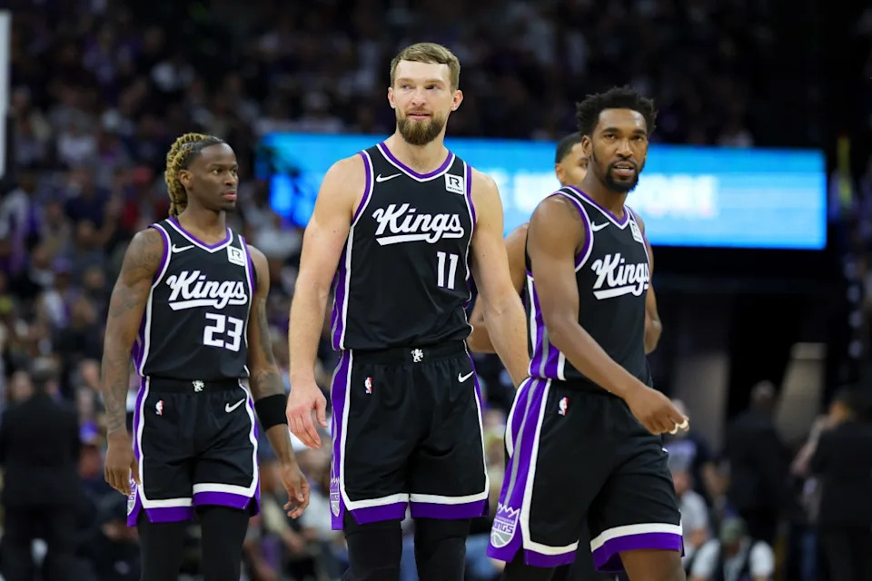 Sacramento Kings forward Domantas Sabonis (11) and guard Malik Monk (0) walk up the court against the Minnesota Timberwolves© Sergio Estrada-Imagn Images
