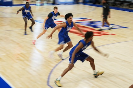 Khaman Maluach, from rear left, and Cooper Flagg, Dylan Harper and Tre Johnson participate...