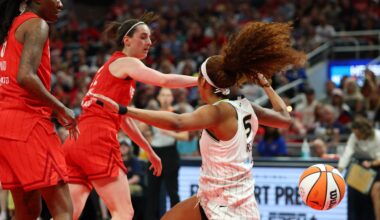 Angel Reese held back by referee after Caitlin Clark draws flagrant foul for shove in fiery Fever-Sky contest