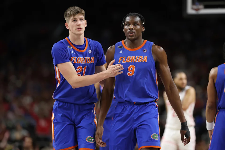 SAN ANTONIO, TEXAS - APRIL 07: Alex Condon #21 and Rueben Chinyelu #9 of the Florida Gators during the second half in the National Championship of the NCAA Men's Basketball Tournament against the Houston Cougars at the Alamodome on April 07, 2025 in San Antonio, Texas. (Photo by Jamie Squire/Getty Images)