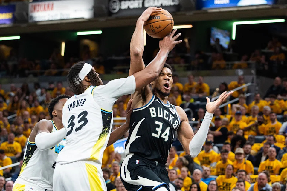 Giannis Antetokounmpo goes up with a shot against Myles Turner of the Indiana Pacers at Gainbridge Fieldhouse on April 29, 2025. © Trevor Ruszkowski-Imagn Images