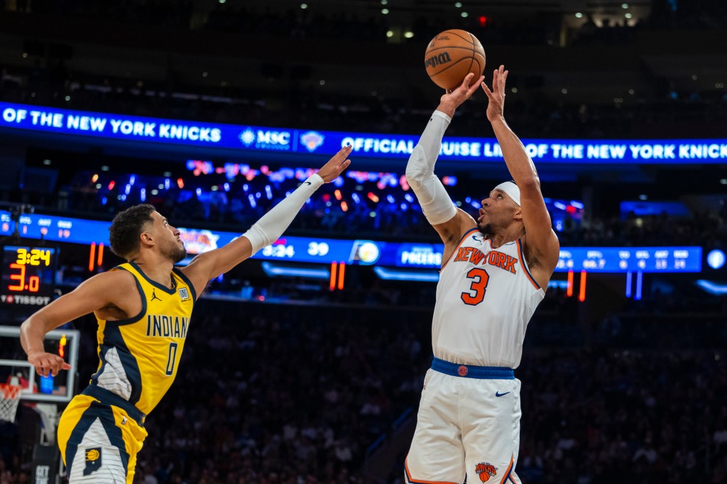 
New York Knicks guard Josh Hart (3) shoots over Indiana Pacers guard Tyrese Haliburton (0) in the first half at Madison Square Garden, Friday, Oct. 25, 2024, in New York, NY.