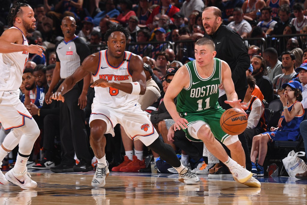 Payton Pritchard #11 of the Boston Celtics drives to the basket during the game against the New York Knicks during Round Two Game Three of the 2025 NBA Playoffs on May 10, 2025 at Madison Square Garden in New York City, New York. 
