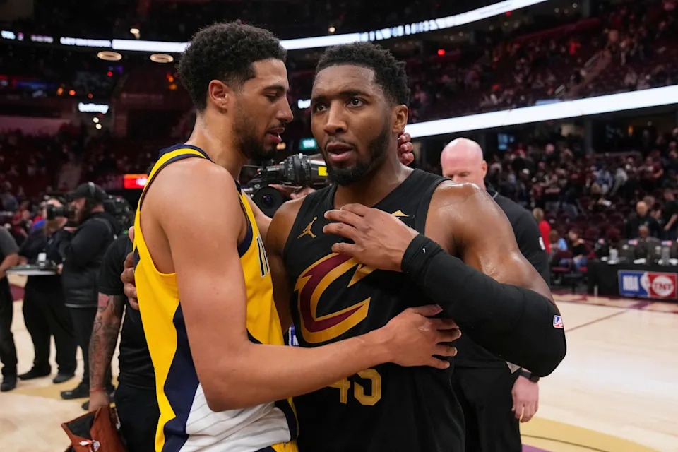 Indiana Pacers guard Tyrese Haliburton, left, and Cleveland Cavaliers guard Donovan Mitchell greet each other after the Pacers defeated the Cleveland Cavaliers 114-105 in Game 5 of an Eastern Conference semifinal NBA basketball playoff Tuesday, May 13, 2025, in Cleveland. (AP Photo/Sue Ogrocki)