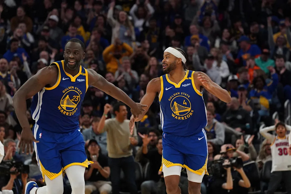 Golden State Warriors players Moses Moody and Draymond Green© David Gonzales-Imagn Images
