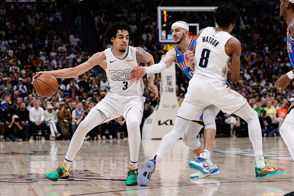 May 15, 2025; Denver, Colorado, USA; Denver Nuggets guard Julian Strawther (3) controls the ball as forward Peyton Watson (8) screens against Oklahoma City Thunder guard Alex Caruso (9) in the fourth quarter during game six of the second round for the 2025 NBA Playoffs at Ball Arena. Mandatory Credit: Isaiah J. Downing-Imagn Images