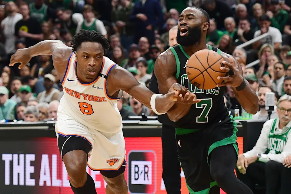 May 14, 2025; Boston, Massachusetts, USA; Boston Celtics guard Jaylen Brown (7) controls the ball from New York Knicks forward OG Anunoby (8) in the second half during game five of the second round for the 2025 NBA Playoffs at TD Garden. Mandatory Credit: Bob DeChiara-Imagn Images