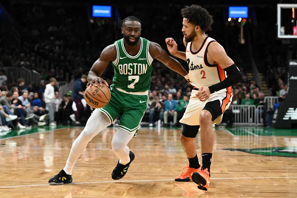 Dec 4, 2024; Boston, Massachusetts, USA; Boston Celtics guard Jaylen Brown (7) drives to the basket against against Detroit Pistons guard Cade Cunningham (2) during the third quarter at the TD Garden.© Brian Fluharty-Imagn Images
