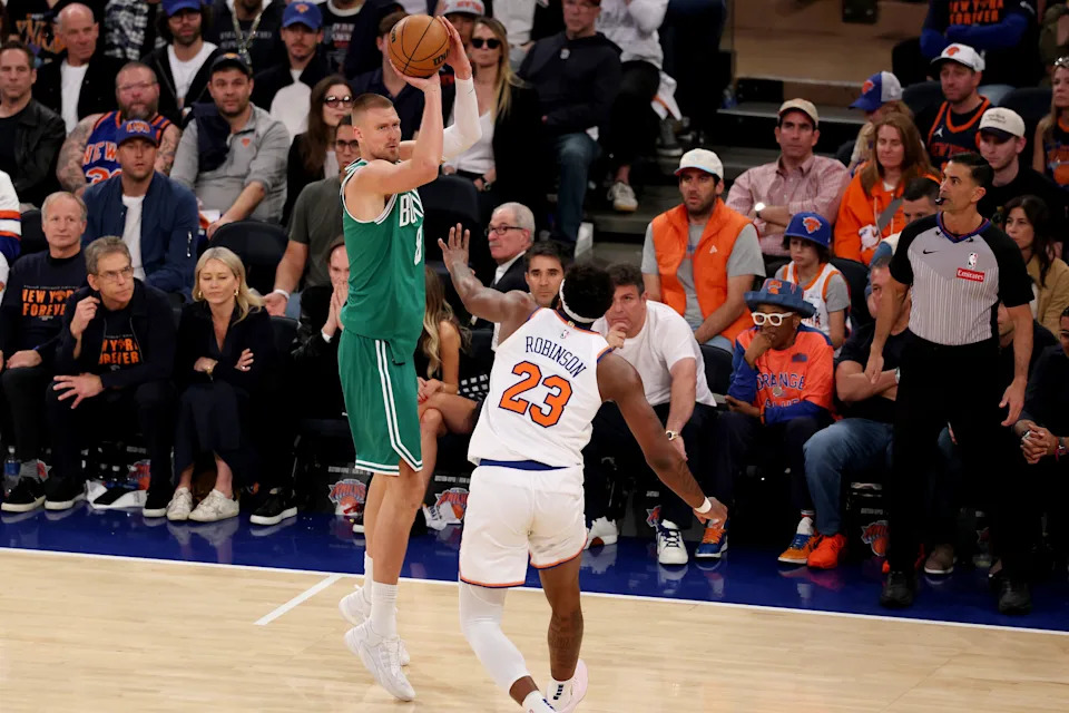 NEW YORK, NEW YORK - MAY 10: Kristaps Porzingis #8 of the Boston Celtics shoots the ball against Mitchell Robinson #23 of the New York Knicks during the fourth quarter in Game Three of the Eastern Conference Second Round NBA Playoffs at Madison Square Garden on May 10, 2025 in New York City. NOTE TO USER: User expressly acknowledges and agrees that, by downloading and or using this photograph, User is consenting to the terms and conditions of the Getty Images License Agreement. (Photo by Al Bello/Getty Images)