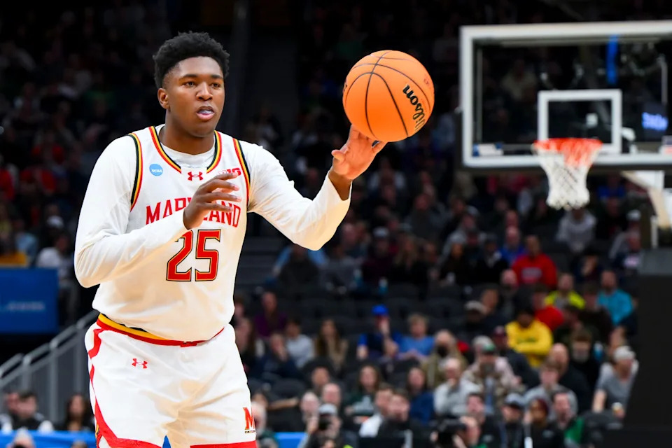 Mar 23, 2025; Seattle, WA, USA; Maryland Terrapins center Derik Queen (25) passes the ball against the Colorado State Rams in the first half at Climate Pledge Arena. Mandatory Credit: Steven Bisig-Imagn Images