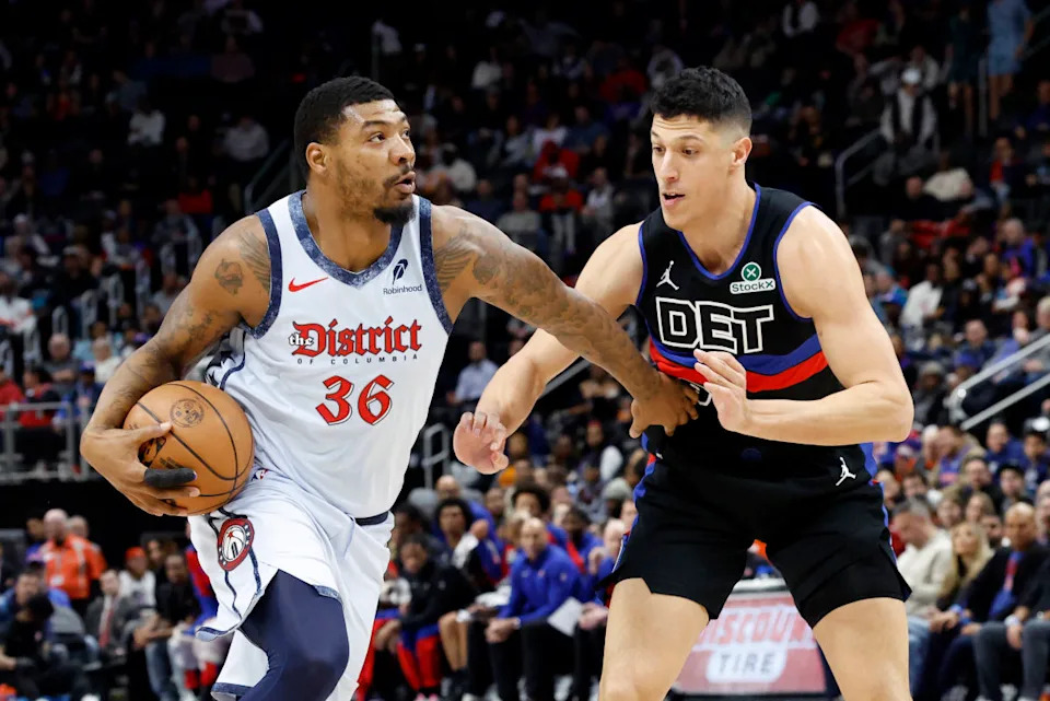 Mar 13, 2025; Detroit, Michigan, USA; Washington Wizards guard Marcus Smart (36) dribbles defended by Detroit Pistons forward Simone Fontecchio (19) in the first half at Little Caesars Arena. Mandatory Credit: Rick Osentoski-Imagn Images Mandatory Credit&colon; Rick Osentoski-Imagn Images