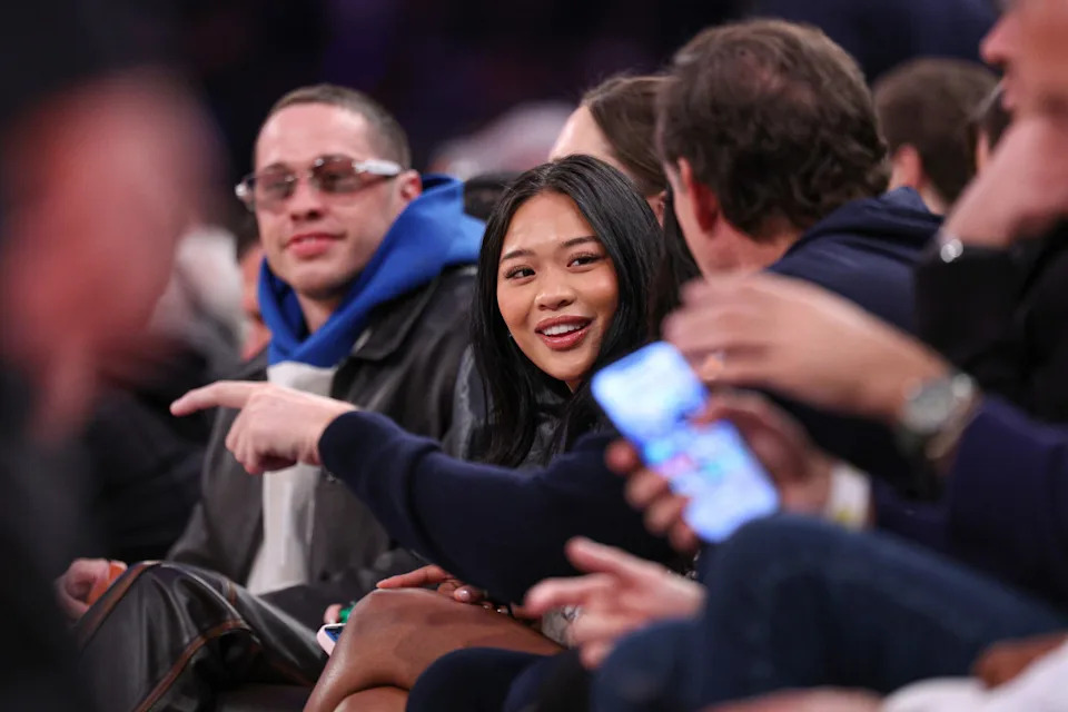 Gymnast Suni Lee sits courtside during the second half of the NBA game between the New York Knicks and the Phoenix Suns.© Vincent Carchietta-Imagn Images