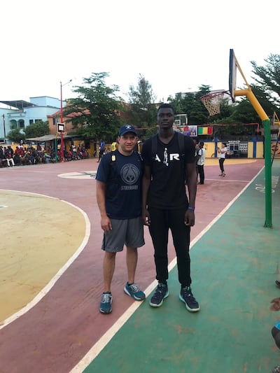 Carlos Iglesias, left, and Keba Keita meet for first time in August 2019 at one of the top outdoor facilities for basketball clubs named Centre "Hirondelle" de Baske-ball in Bamako, Mali.