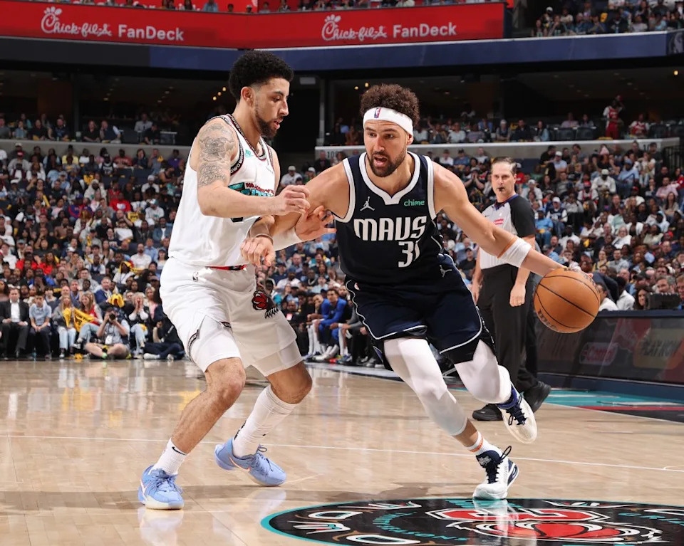Klay Thompson of the Dallas Mavericks handles the ball during the game against the Memphis Grizzlies during the 2025 SoFi Play-In Tournament on April 18, 2025. NBAE via Getty Images