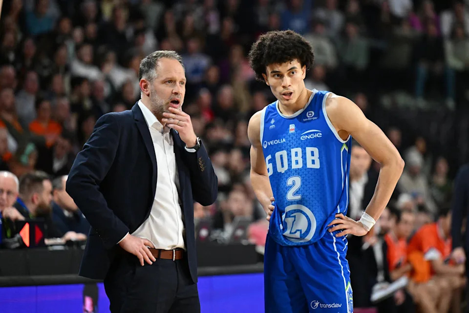 [US, Mexico & Canada customers only] Feb 15, 2025 Caen, FRANCE; St Quentin point guard Nolan Traore with coach Julien Mahe against Le Mans in a Leaders Cup match. Mandatory Credit: Franck Faugere/Presse Sports via Imagn Images