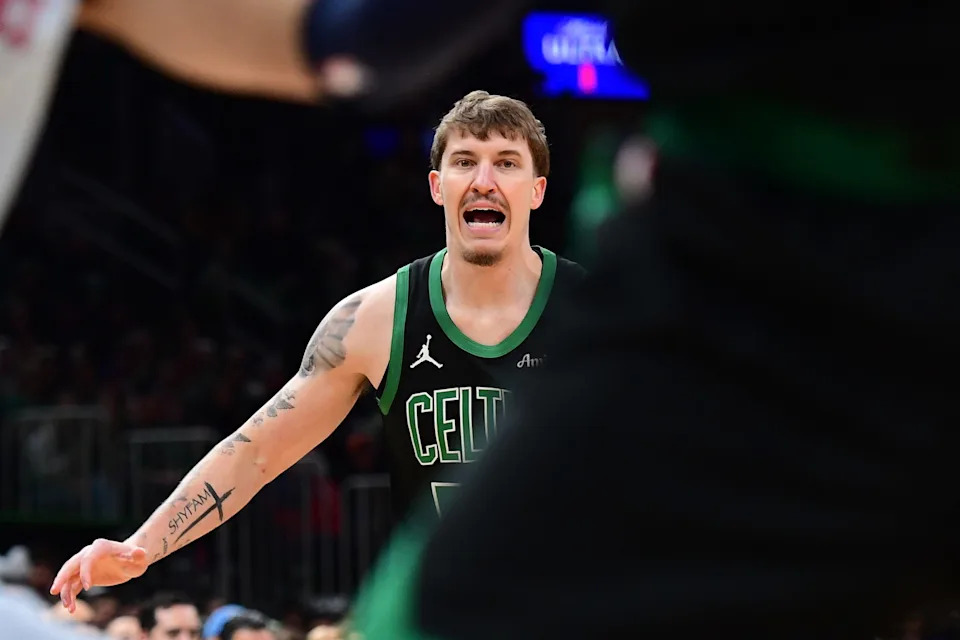 Apr 6, 2025; Boston, Massachusetts, USA; Boston Celtics forward Baylor Scheierman (55) during the second half against the Washington Wizards at TD Garden. Mandatory Credit: Bob DeChiara-Imagn Images