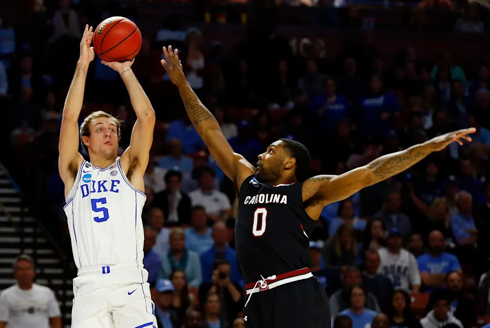 Duke Blue Devils guard Luke Kennard (5) shoots against South Carolina Gamecocks guard Sindarius Thornwell.