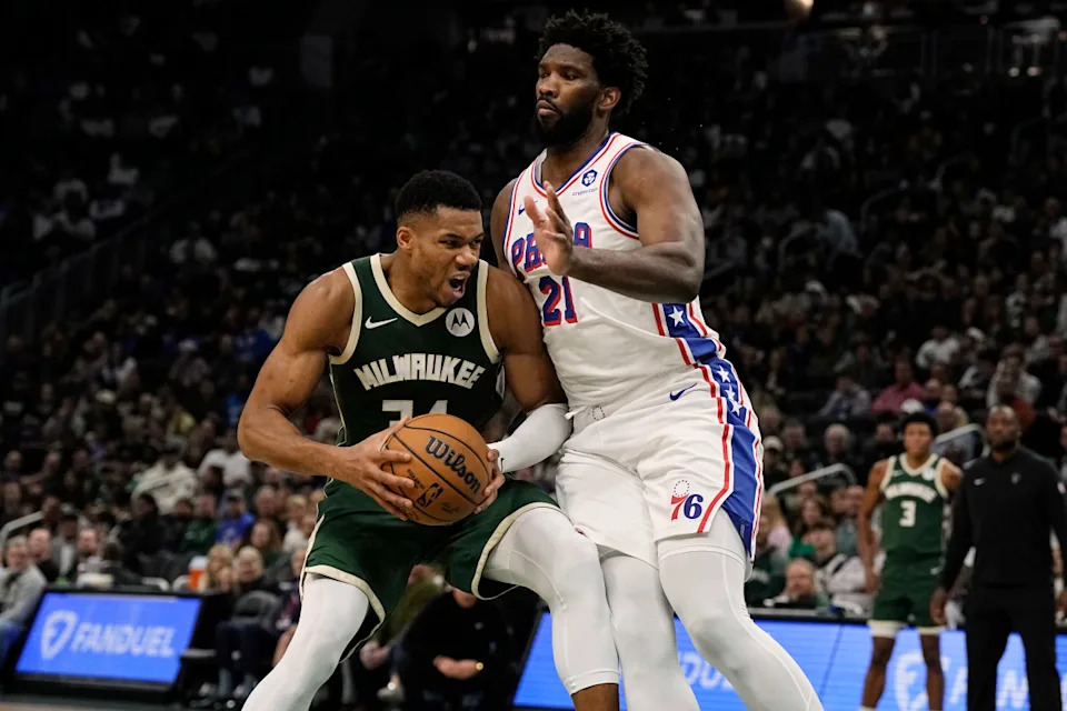 Milwaukee Bucks forward Giannis Antetokounmpo looks to shoot against Philadelphia 76ers center Joel Embiid during the second quarter at Fiserv Forum.Jeff Hanisch-Imagn Images