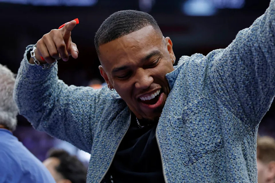 Amon-Ra St. Brown of the Lions celebrates during a Pistons game on April 24, 2025. © Rick Osentoski-Imagn Images