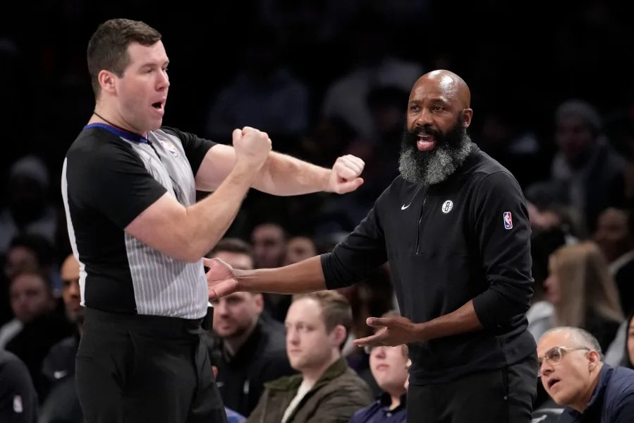 Brooklyn Nets head coach Jacque Vaughn, right, argues with referee Matt Kallio, left, during the second half of an NBA basketball game against the Miami Heat, Monday, Jan. 15, 2024, in New York. (AP Photo/Mary Altaffer)