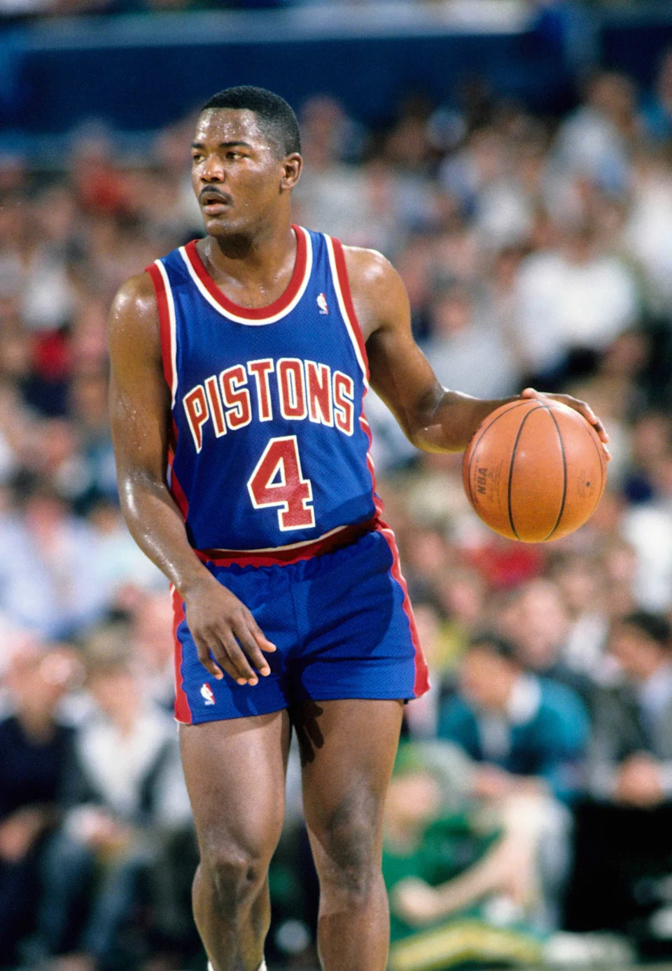 Joe Dumars spent his entire 14-year NBA career with the Detroit Pistons, becoming a cornerstone of their "Bad Boys" era. A six-time All-Star and four-time All-Defensive First Team selection, Dumars was known as a clutch shooter and defensive standout — Michael Jordan once called him the best defender he ever faced. He earned the 1989 NBA Finals MVP after averaging 27.3 points per game in a sweep of the Lakers. Known for his quiet leadership and sportsmanship, Dumars' No. 4 jersey was retired by the Pistons, and the NBA's Sportsmanship Award now bears his name .