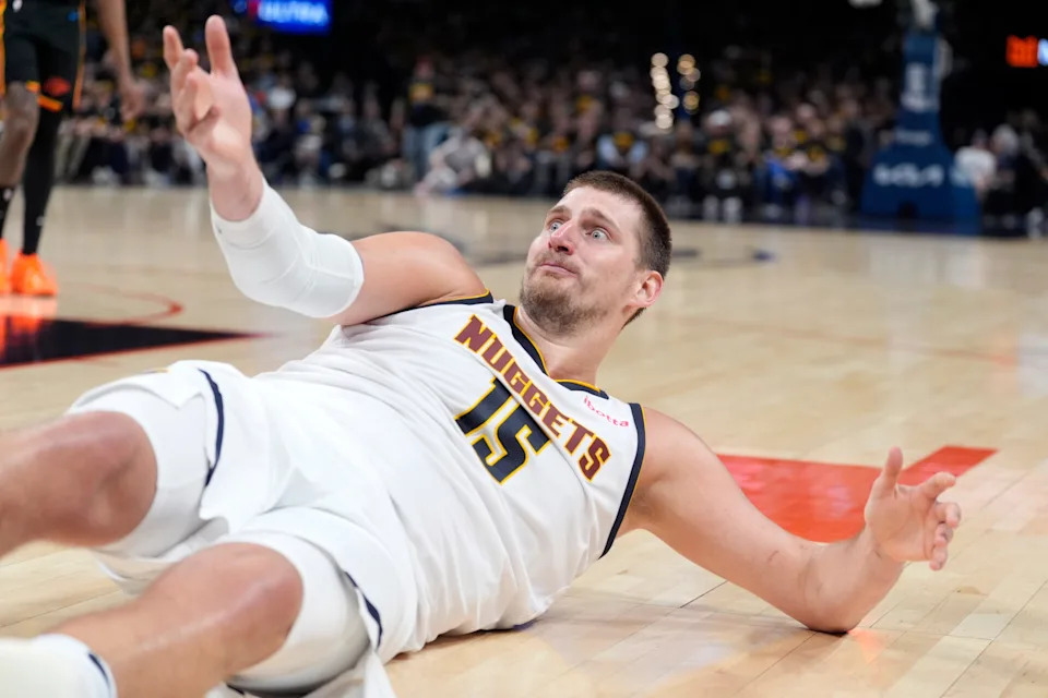 Denver Nuggets center Nikola Jokic (15) gestures after drawing a foul for colliding with Oklahoma City Thunder forward Jaylin Williams (6) during Game 2 of the NBA playoff series between the Oklahoma City Thunder and the Denver Nuggets at Paycom Center in Oklahoma City, Wednesday, May 7, 2025. Oklahoma City won 149-106.