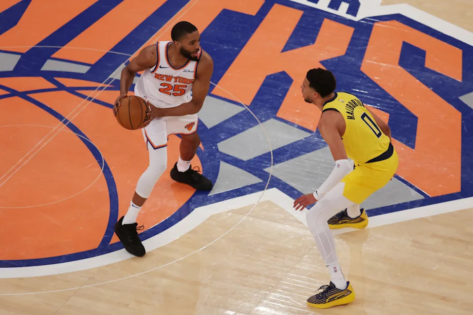 May 21, 2025; New York, New York, USA; New York Knicks forward Mikal Bridges (25) controls the ball against Indiana Pacers guard Tyrese Haliburton (0) in the first quarter during game one of the Eastern Conference Finals for the 2025 NBA Playoffs at Madison Square Garden.© Brad Penner-Imagn Images