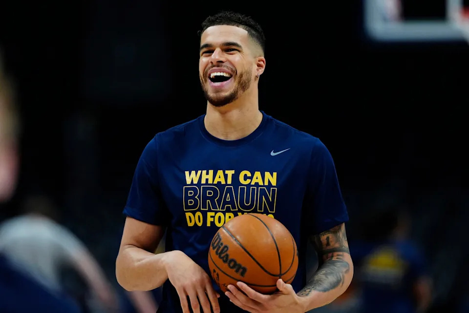 Apr 11, 2025; Denver, Colorado, USA; Denver Nuggets forward Michael Porter Jr. (1) reacts before the game against the Memphis Grizzlies at Ball Arena. Mandatory Credit: Ron Chenoy-Imagn Images Ron Chenoy-Imagn Images