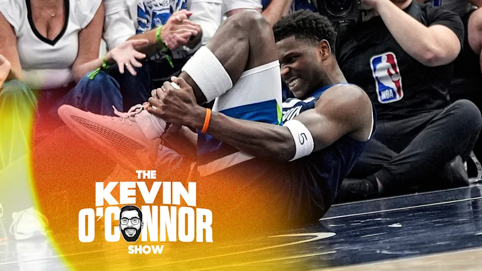 Minnesota Timberwolves guard Anthony Edwards (5) grabs his leg during the first half of Game 2 of an NBA basketball second-round playoff series against the Golden State Warriors, Thursday, May 8, 2025, in Minneapolis. (AP Photo/Abbie Parr)