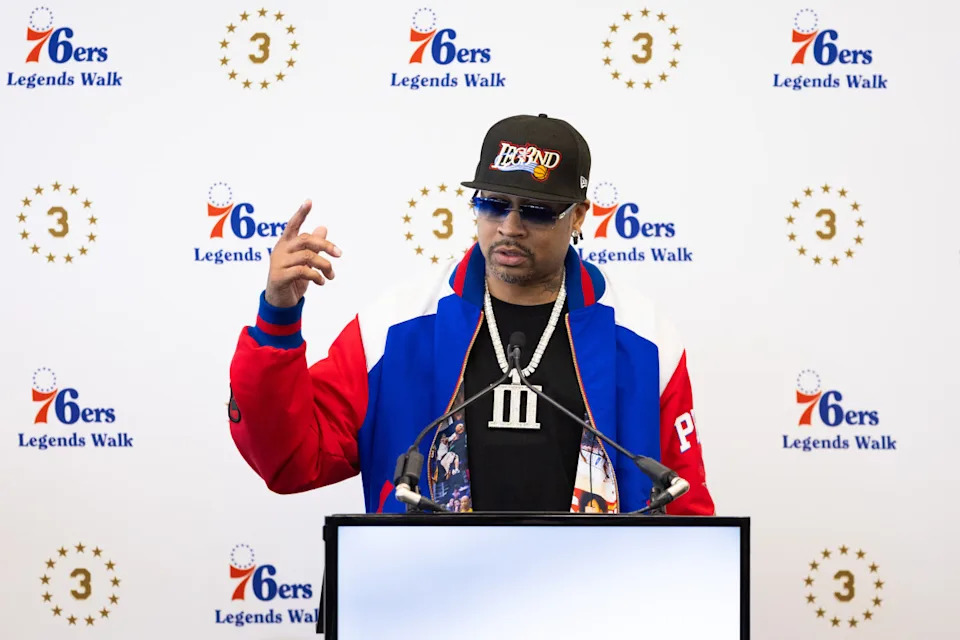 Philadelphia 76ers great Allen Iverson speaks at the podium during the unveiling of his statue.Bill Streicher-Imagn Images