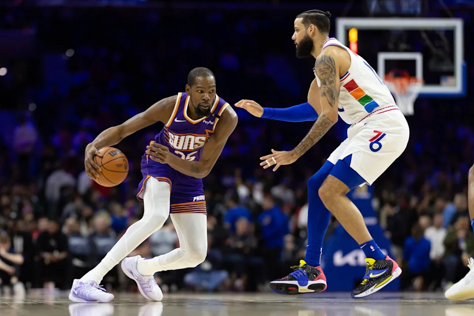 Phoenix Suns forward Kevin Durant against Philadelphia 76ers forward Caleb MartinBill Streicher-Imagn Images
