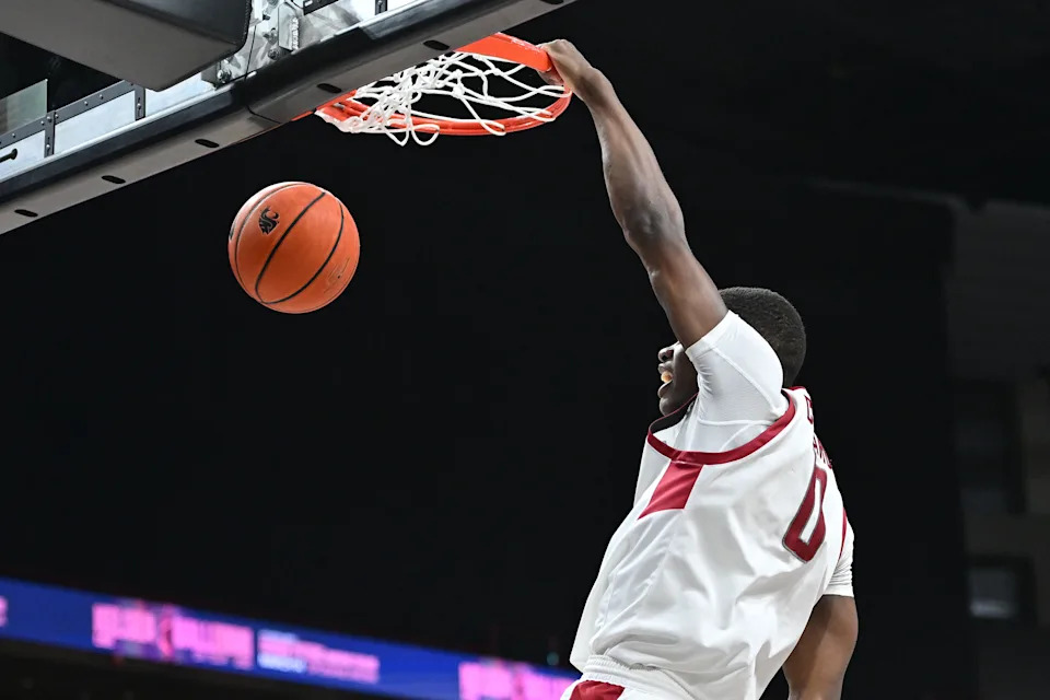 Nov 21, 2024; Spokane, Washington, USA; Washington State Cougars guard Cedric Coward (0) dunks the ball against the Eastern Washington Eagles in the second half at Spokane Veterans Memorial Arena. Washington State Cougars won 96-81. Mandatory Credit: James Snook-Imagn Images