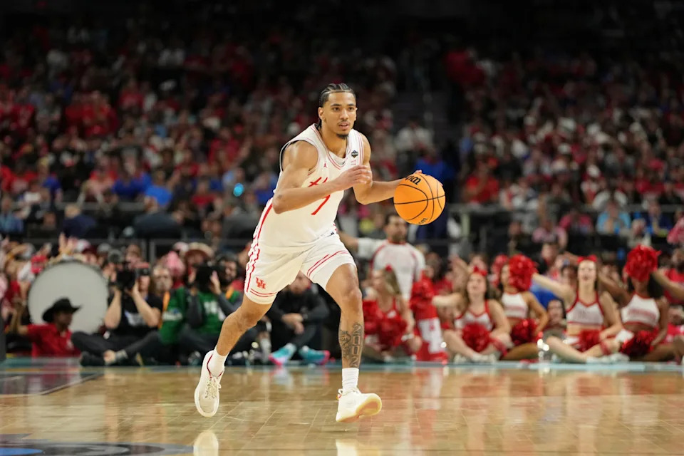 Apr 7, 2025; San Antonio, TX, USA; Houston Cougars guard Milos Uzan (7) dribbles the ball against the Florida Gators during the first half of the national championship game of the Final Four of the 2025 NCAA Tournament at the Alamodome. Mandatory Credit: Bob Donnan-Imagn Images