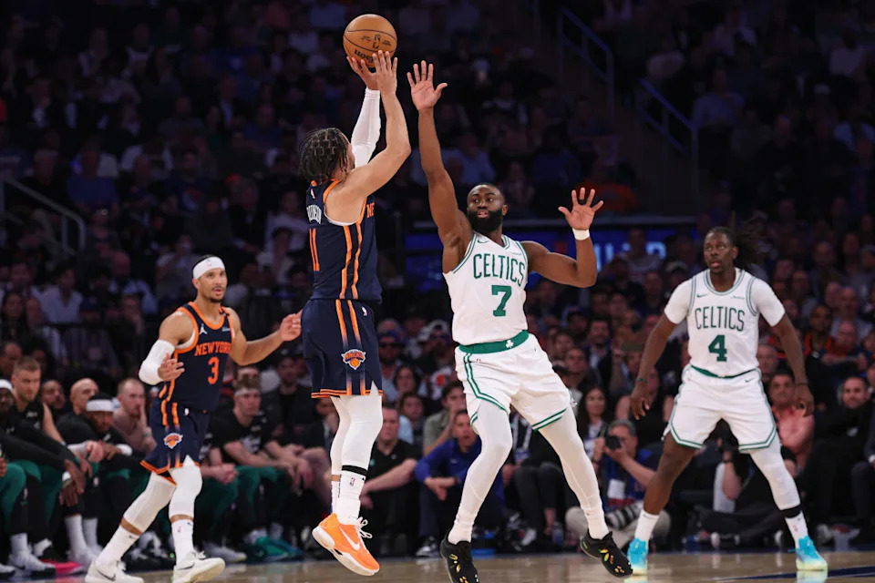 New York Knicks guard Jalen Brunson shoots against Boston Celtics guard Jaylen Brown.Vincent Carchietta-Imagn Images