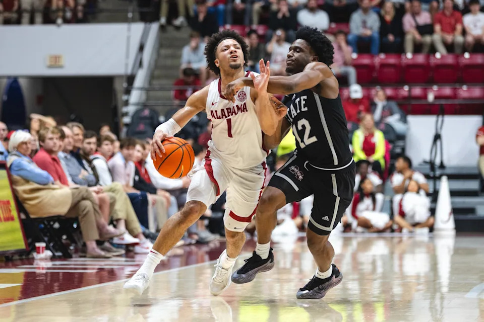 Alabama Crimson Tide guard Mark Sears and Mississippi State Bulldogs guard Josh HubbardWill McLelland-Imagn Images