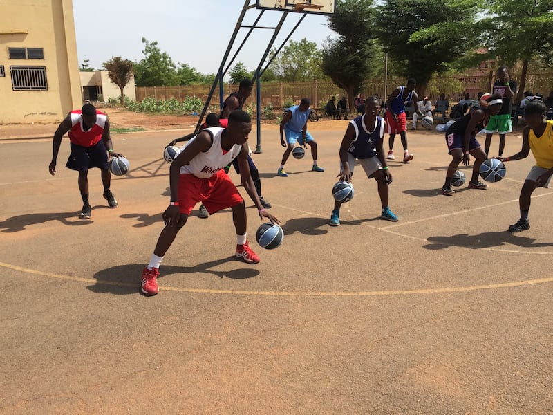 Students receive instruction at basketball camp at The "Palais" des SPORTS in Bamako, Mali, in April 2016.
